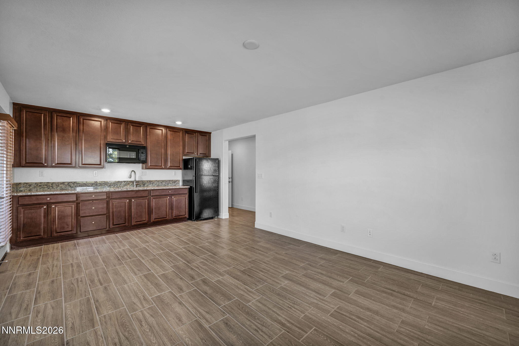 7181 Saddlehorn Road Carson City, NV 89701 - Photo 27 of 62 a view of kitchen with wooden floor