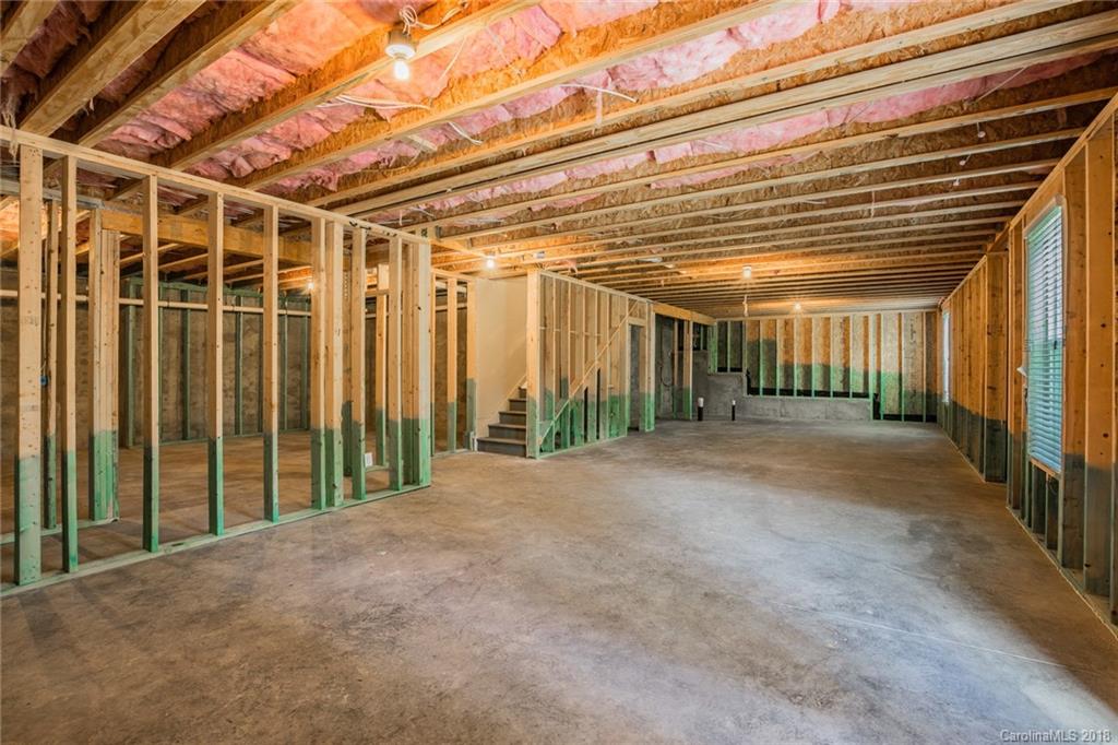 5116 Waterloo Drive, Unit 60 Tega Cay, SC 29708 - Photo 34 of 36 a view of a room with wooden walls