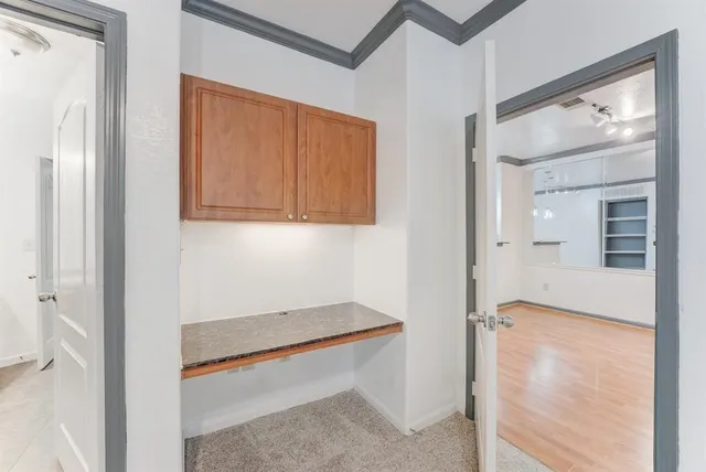 a hallway with sliding door and yard