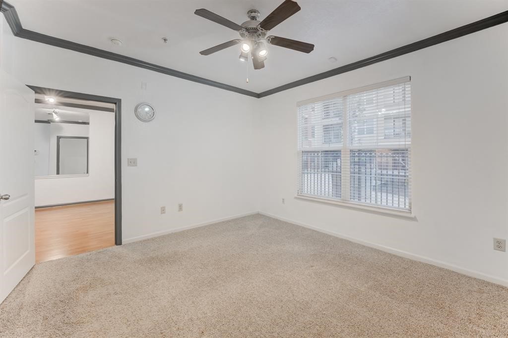 1711 Old Spanish Trail, Unit 110 Houston, TX 77054 - Photo 21 of 31 a view of an empty room with a window