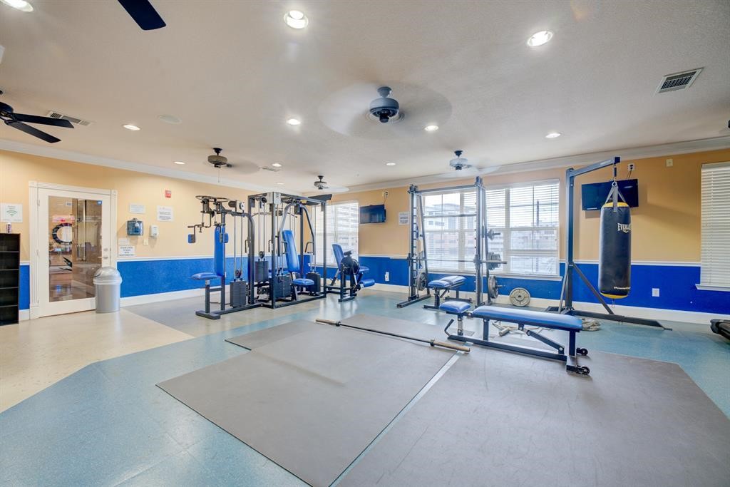 1711 Old Spanish Trail, Unit 110 Houston, TX 77054 - Photo 26 of 31 a view of a room with gym equipment