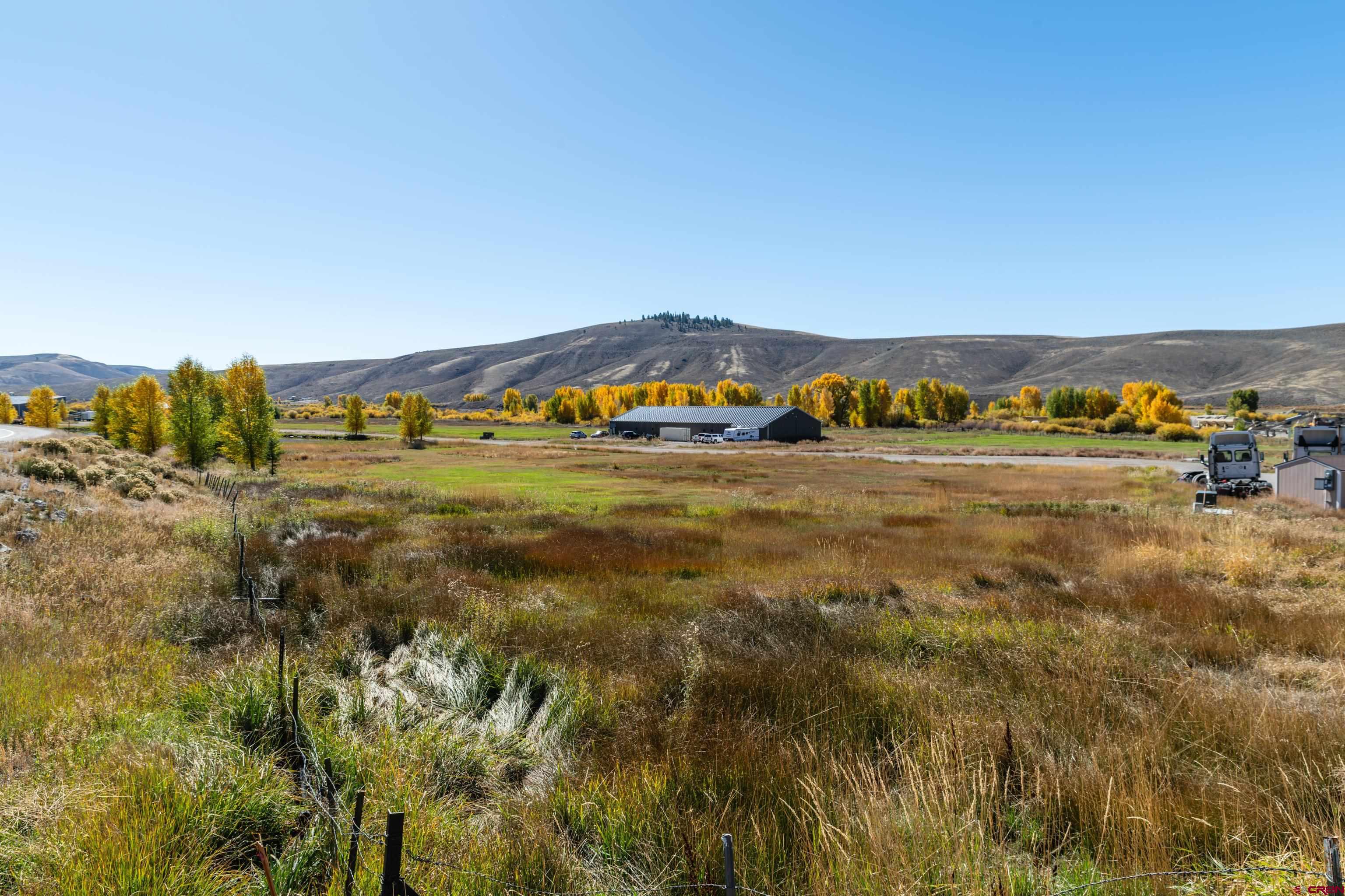 301 Griffing Road Gunnison, CO 81230 - Photo 3 of 20 a view of an outdoor space and mountain view