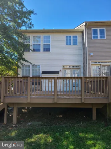a view of swimming pool with a deck