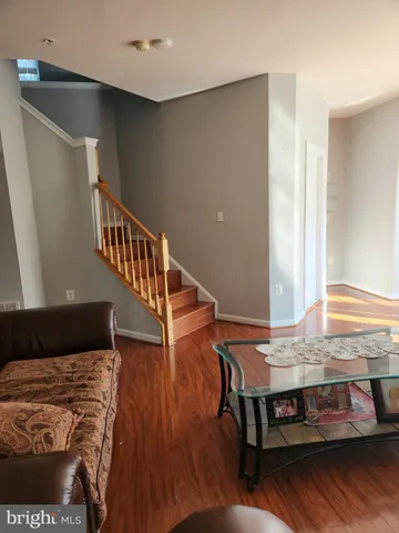 a kitchen with stainless steel appliances a stove a sink and a refrigerator