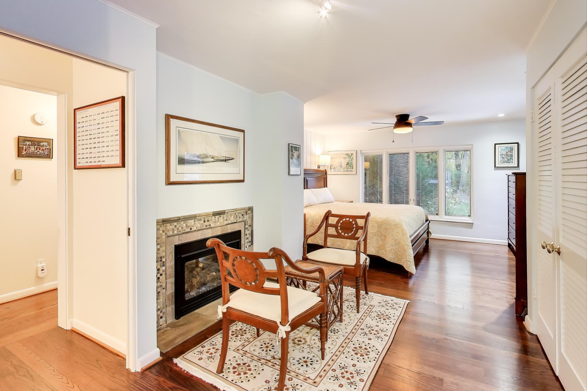 49 Aspen Road Ogden Dunes, IN 46368 - Photo 19 of 42 a living room with furniture and a fireplace