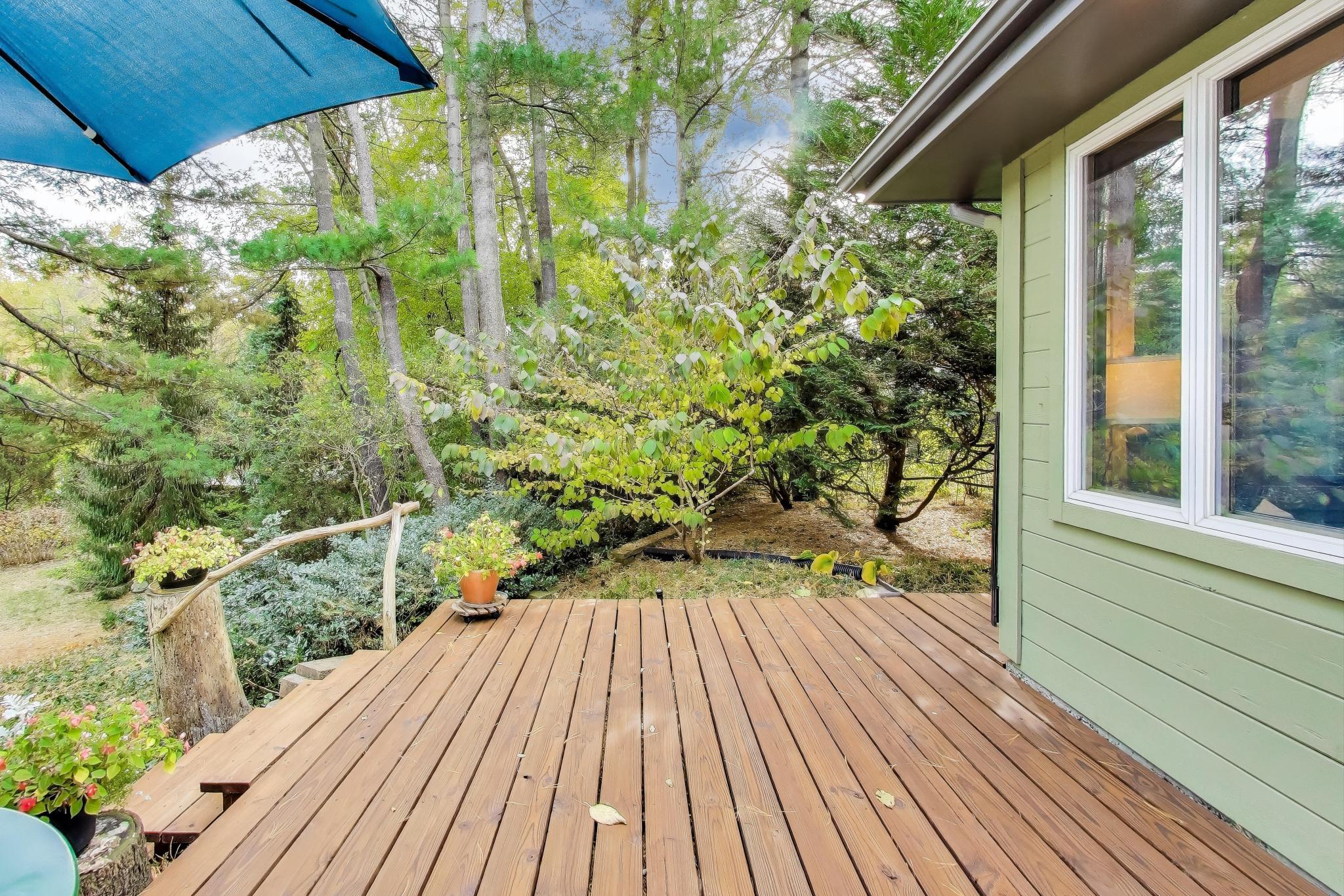 49 Aspen Road Ogden Dunes, IN 46368 - Photo 31 of 42 a view of balcony with wooden floor and fence