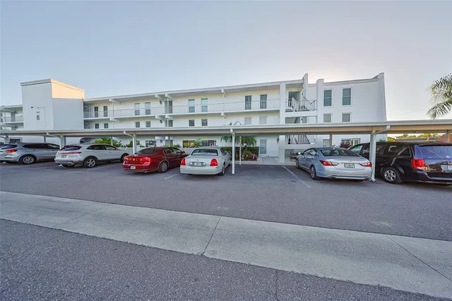 a car parked in the parking lot of a building