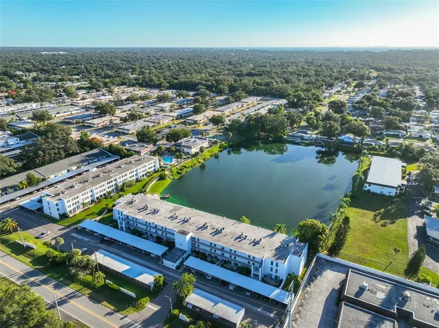 an aerial view of a house with outdoor space