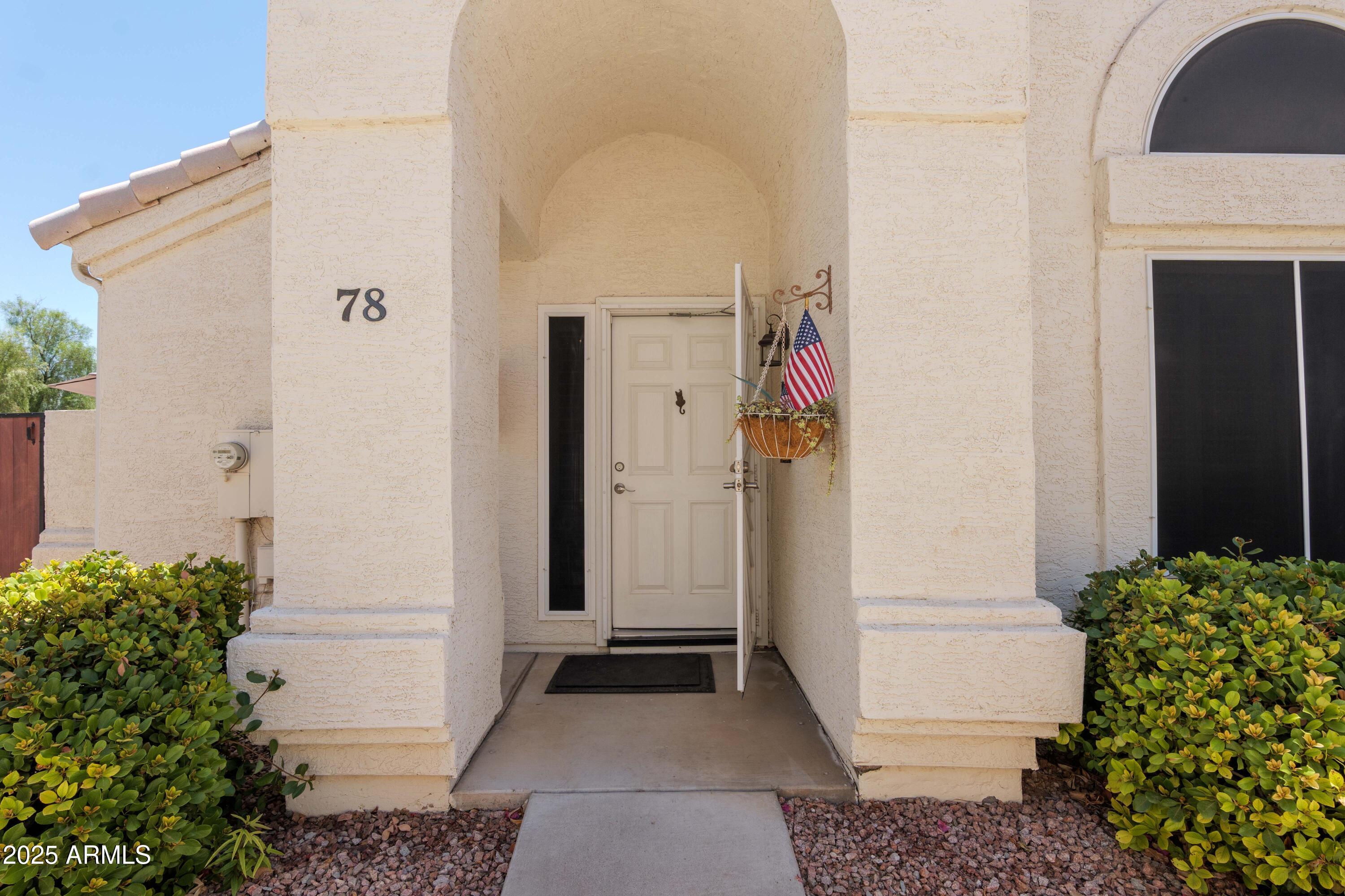 2100 West Lemon Tree Place, Unit 78 Chandler, AZ 85224 - Photo 23 of 32 a view of a entryway door of the house