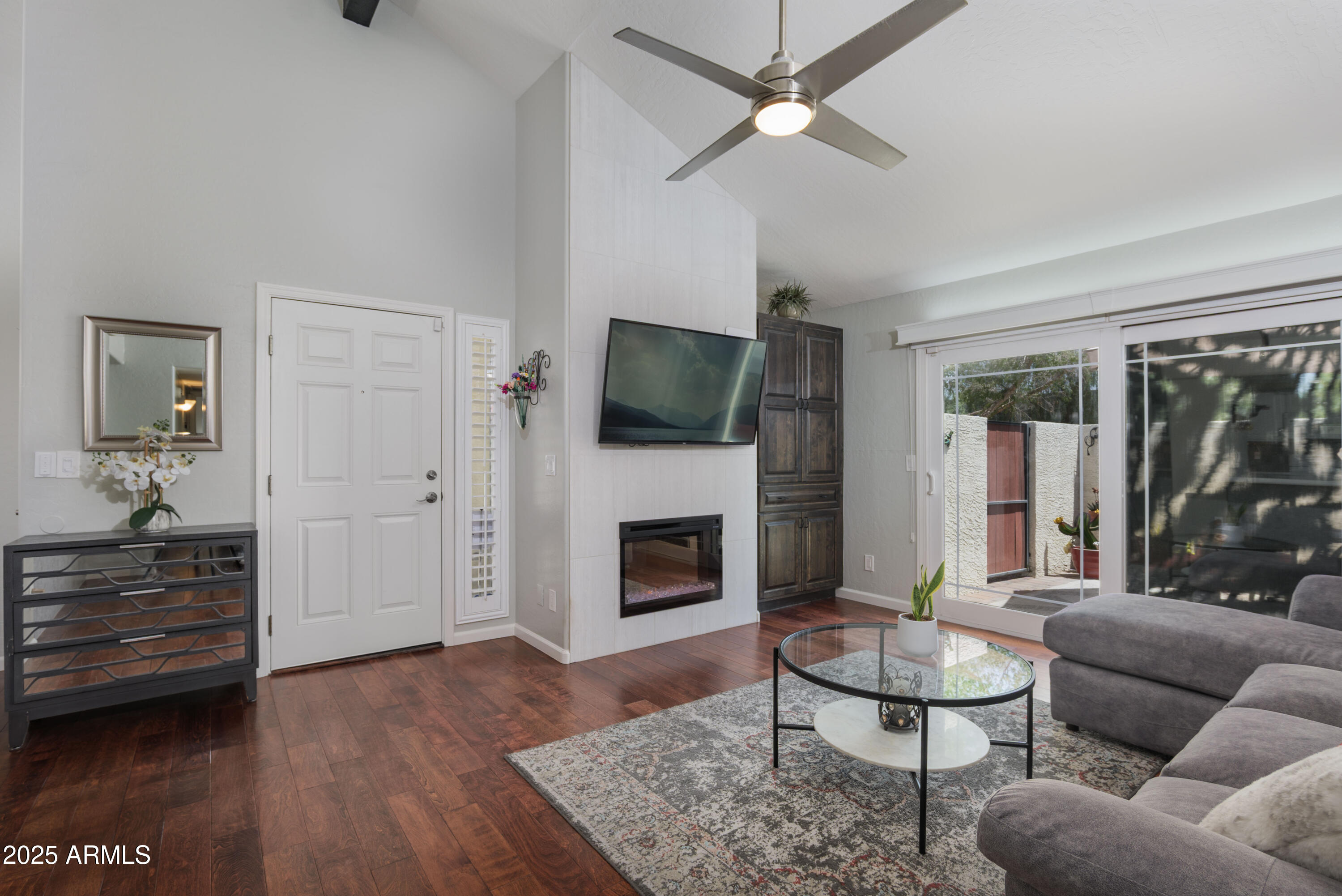 2100 West Lemon Tree Place, Unit 78 Chandler, AZ 85224 - Photo 10 of 32 a living room with furniture and a fireplace