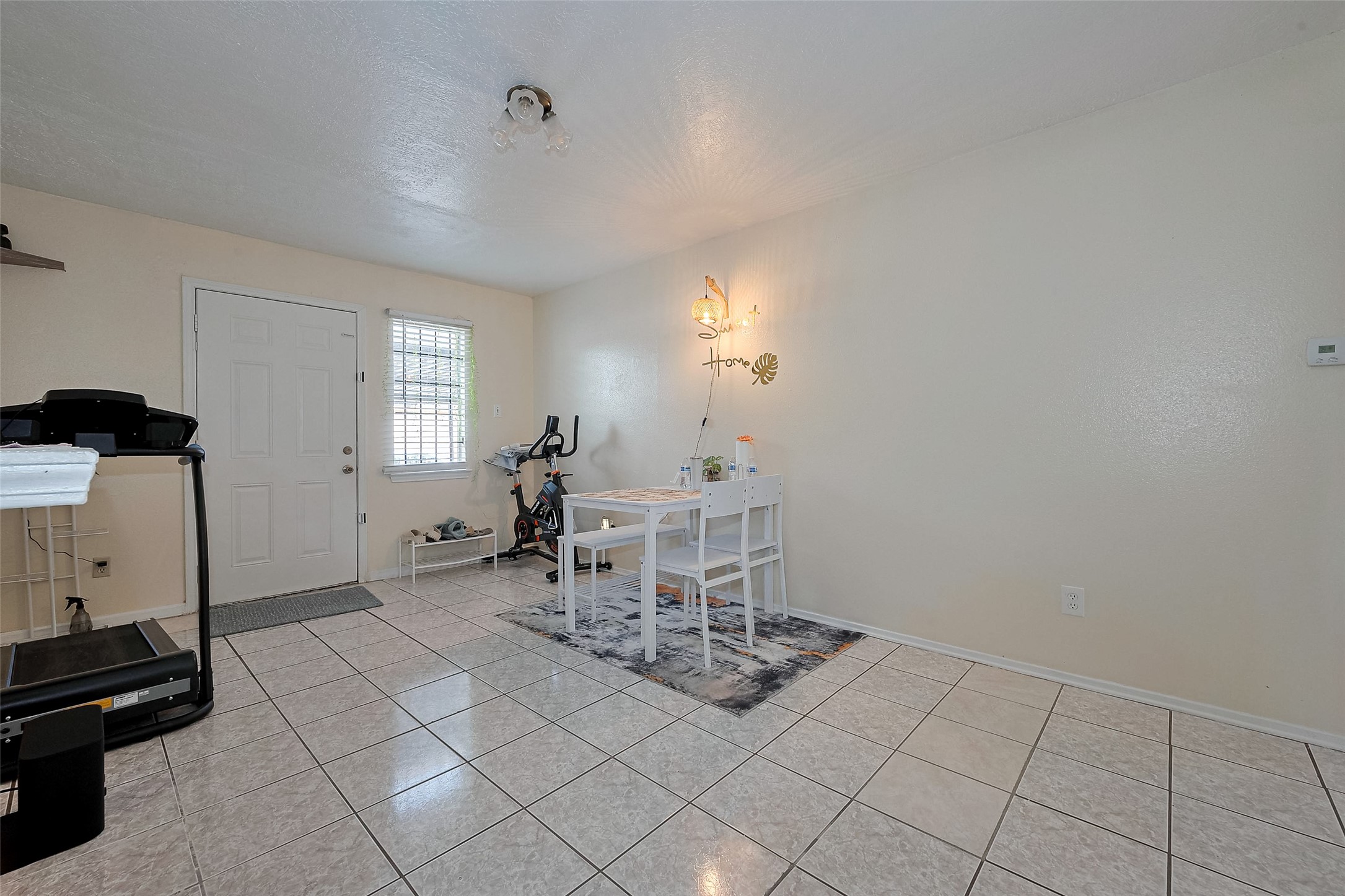 12223 Sharpview Drive Houston, TX 77072 - Photo 14 of 41 a view of a workspace with furniture and a window