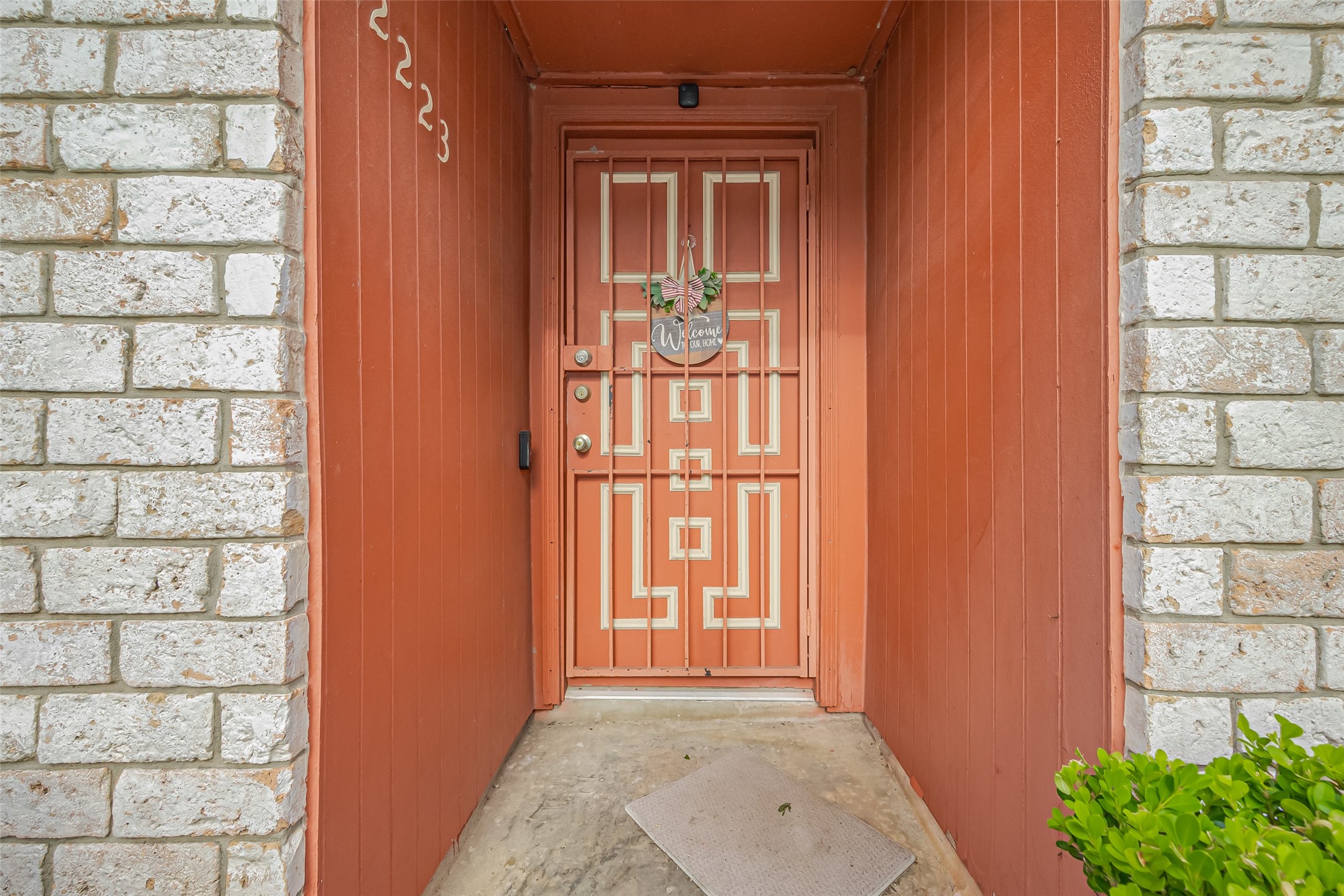12223 Sharpview Drive Houston, TX 77072 - Photo 6 of 41 wooden floor in a room with a door