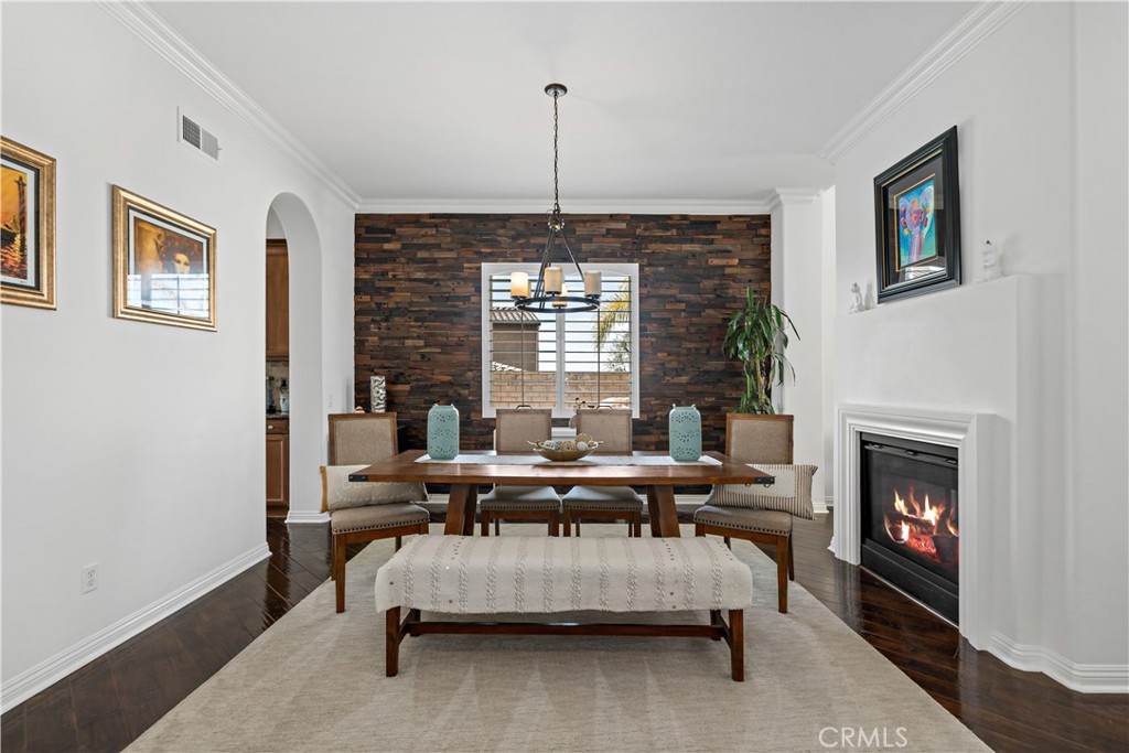 16423 Village Meadow Drive Riverside, CA 92503 - Photo 12 of 61 a living room with furniture fireplace and window