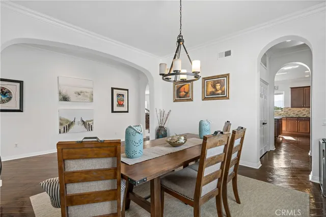 a view of a kitchen with stainless steel appliances granite countertop a refrigerator and a sink
