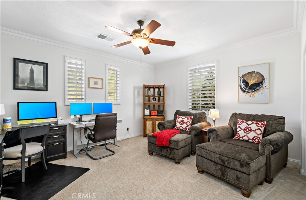 16423 Village Meadow Drive Riverside, CA 92503 - Photo 35 of 61 a living room with furniture and a window