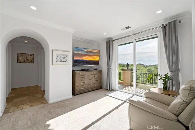 a view of a balcony with lake view and wooden floor