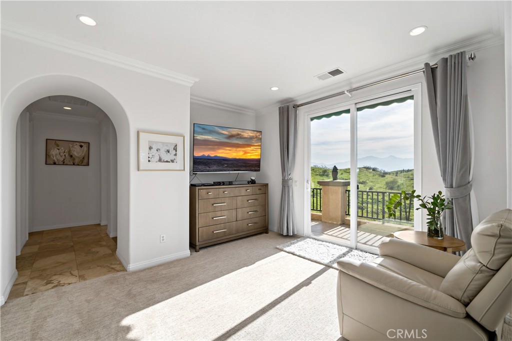 16423 Village Meadow Drive Riverside, CA 92503 - Photo 44 of 61 a living room with furniture a large window with outer view