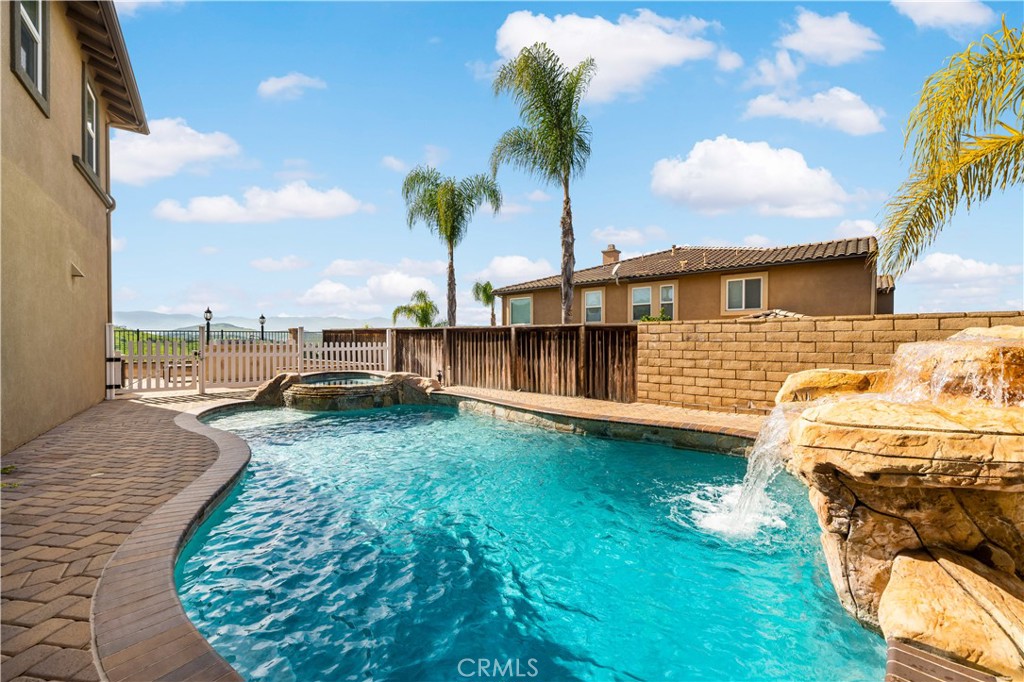 16423 Village Meadow Drive Riverside, CA 92503 - Photo 60 of 61 a view of a backyard with swimming pool