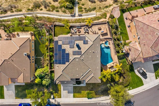 a view of a swimming pool with outdoor seating