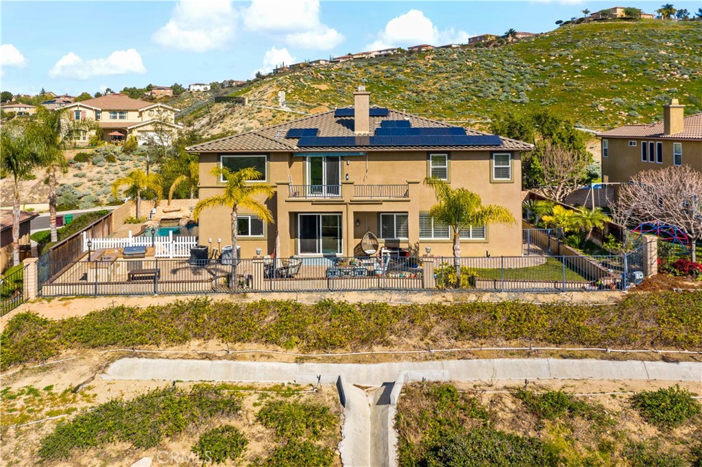 16423 Village Meadow Drive Riverside, CA 92503 - Photo 8 of 61 a view of a swimming pool with outdoor seating