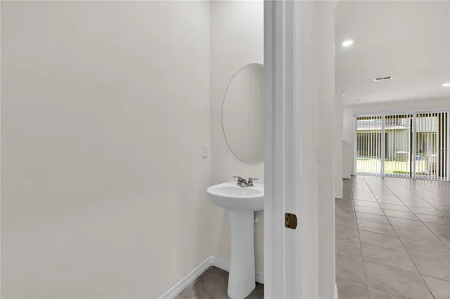 a kitchen with stainless steel appliances granite countertop a stove and a refrigerator