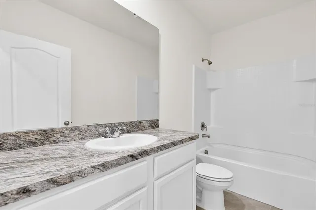 a view of hallway with shower