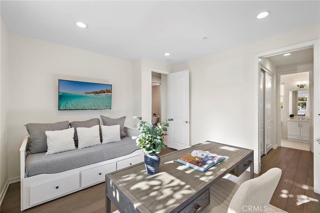 44 Jarano Street Rancho Mission Viejo, CA 92694 - Photo 17 of 65 a living room with furniture and wooden floor