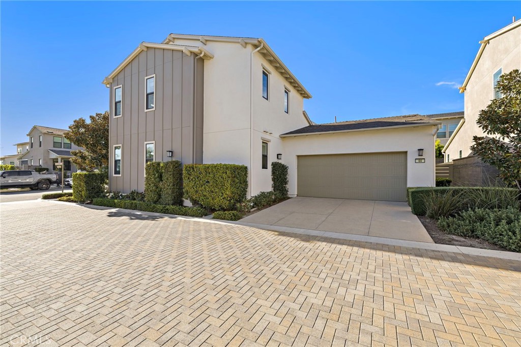 44 Jarano Street Rancho Mission Viejo, CA 92694 - Photo 32 of 65 a front view of a house with a yard