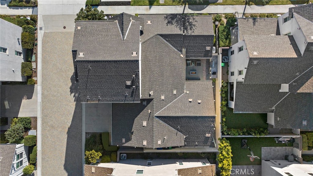 44 Jarano Street Rancho Mission Viejo, CA 92694 - Photo 35 of 65 an aerial view of a house with a yard and a garage