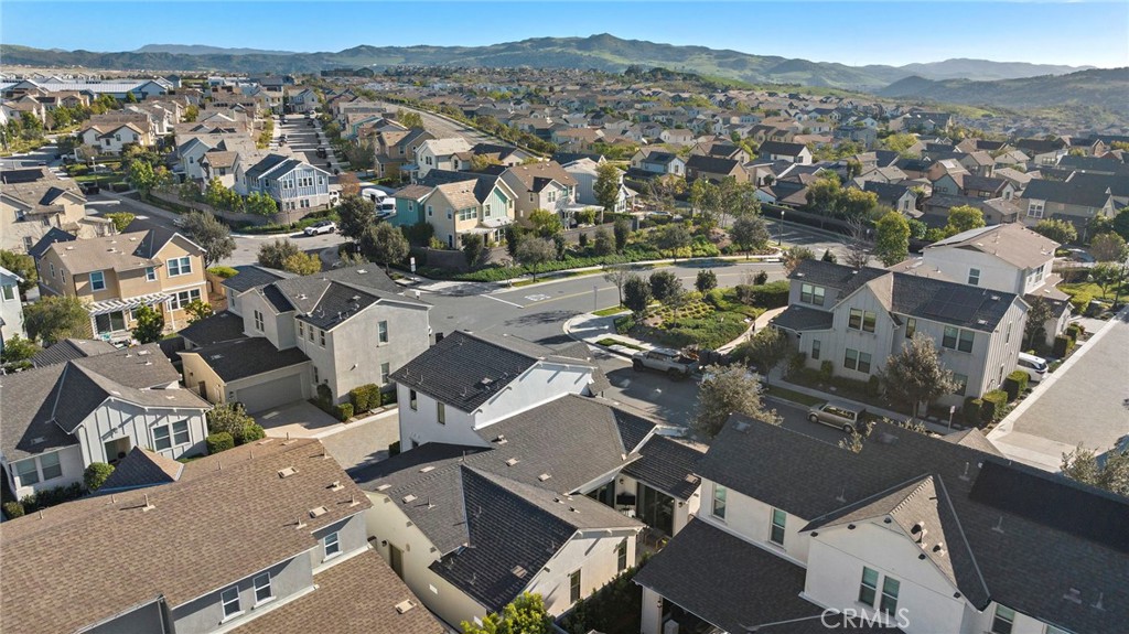 44 Jarano Street Rancho Mission Viejo, CA 92694 - Photo 38 of 65 an aerial view of a city with lots of residential buildings