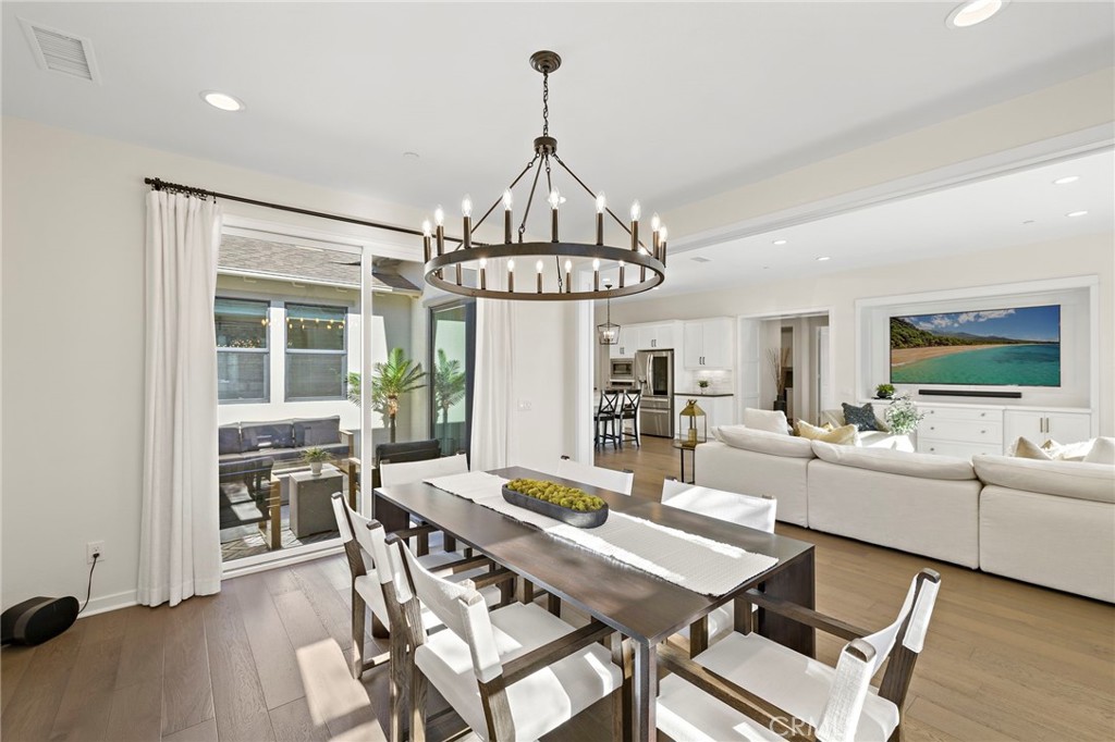 44 Jarano Street Rancho Mission Viejo, CA 92694 - Photo 4 of 65 a view of a dining room with furniture window and wooden floor