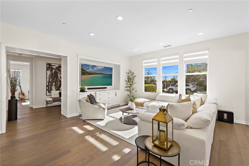 44 Jarano Street Rancho Mission Viejo, CA 92694 - Photo 6 of 65 a living room with furniture and a flat screen tv