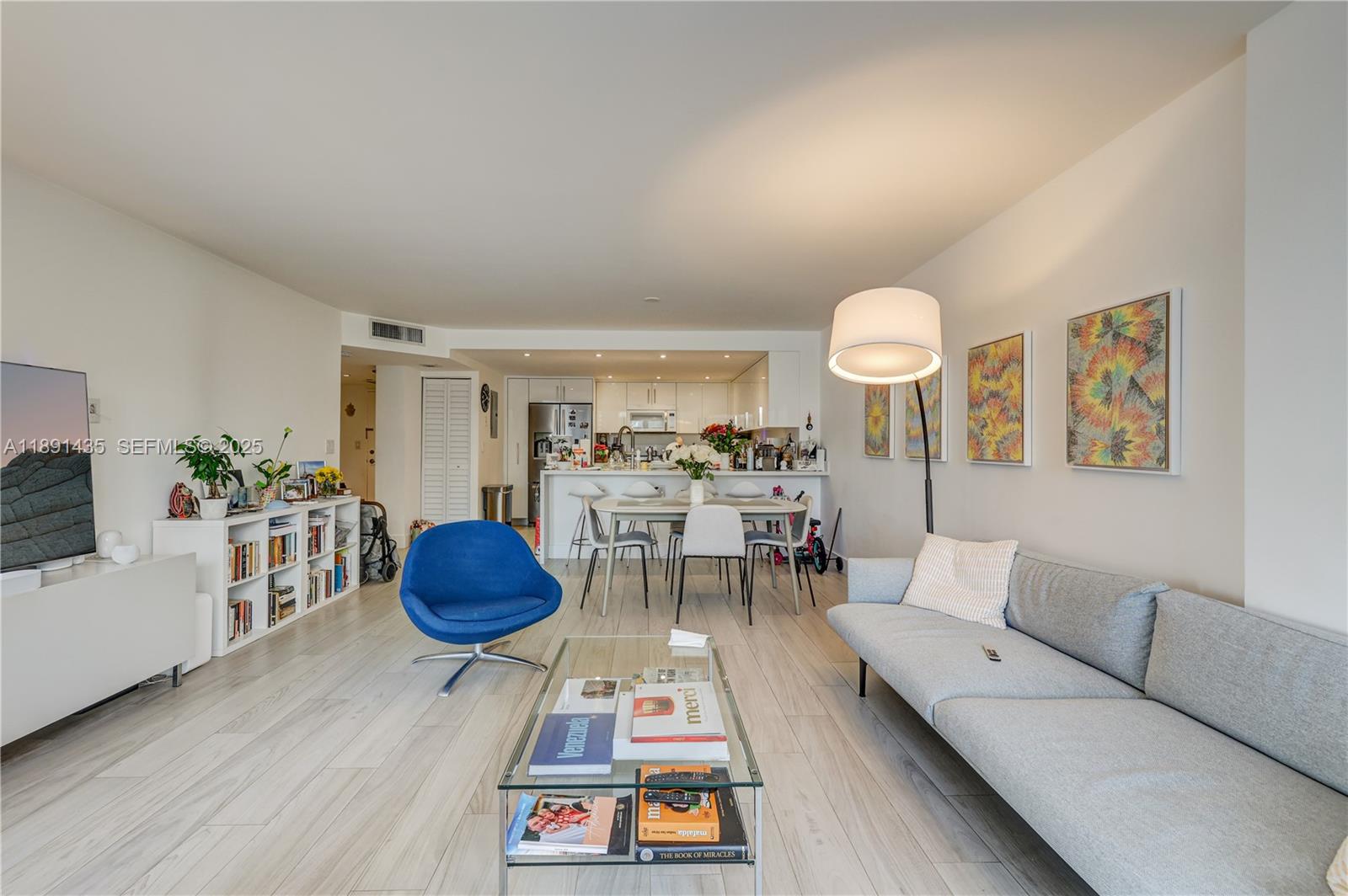 1901 Brickell Avenue, Unit B413 Miami, FL 33129 - Photo 11 of 33 a living room with furniture and wooden floor