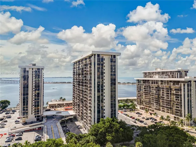 a view of a city with tall buildings