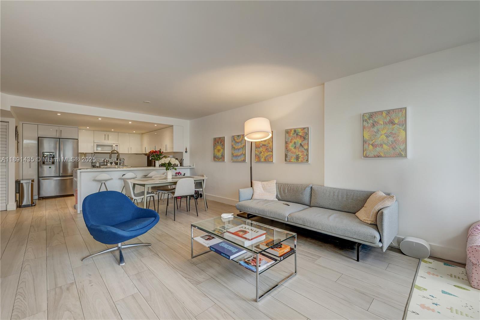 1901 Brickell Avenue, Unit B413 Miami, FL 33129 - Photo 9 of 33 a living room with furniture a rug and a table