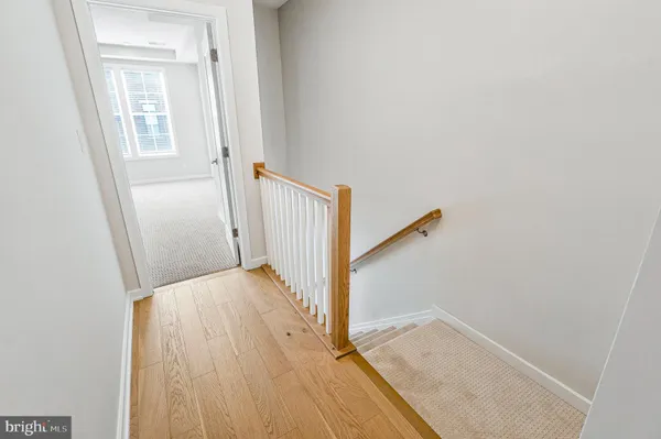 a view of entryway with wooden floor