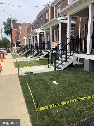 a view of a building with a park