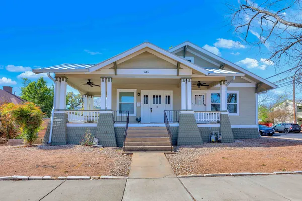 a front view of a house with a porch