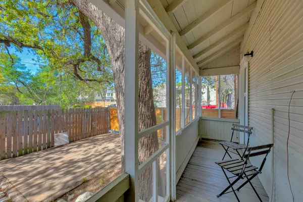 a balcony with chairs