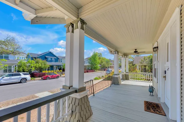 a view of a porch with furniture