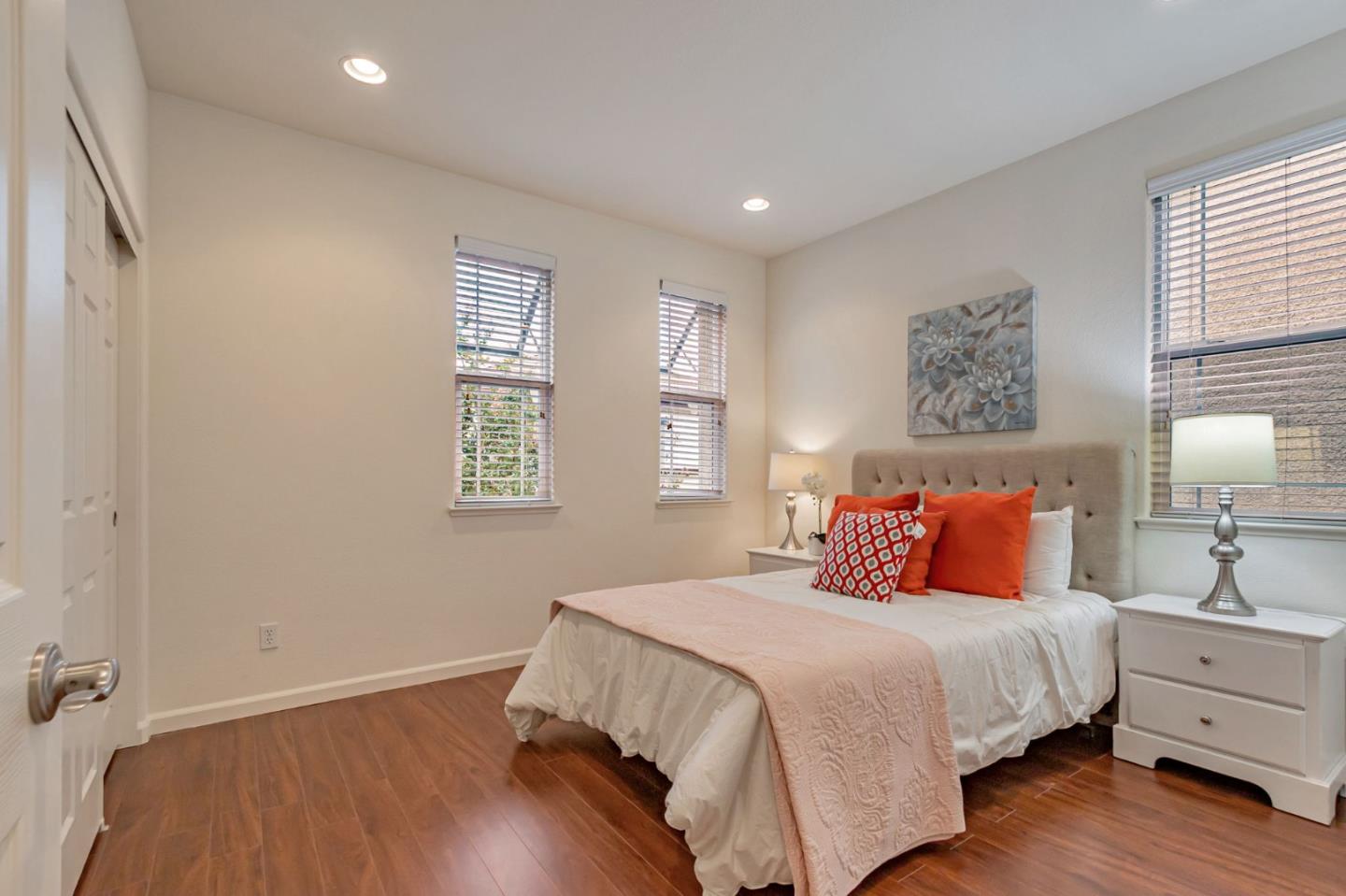 1103 Vida Larga Loop Milpitas, CA 95035 - Photo 18 of 44 a bedroom with a bed and a night stand