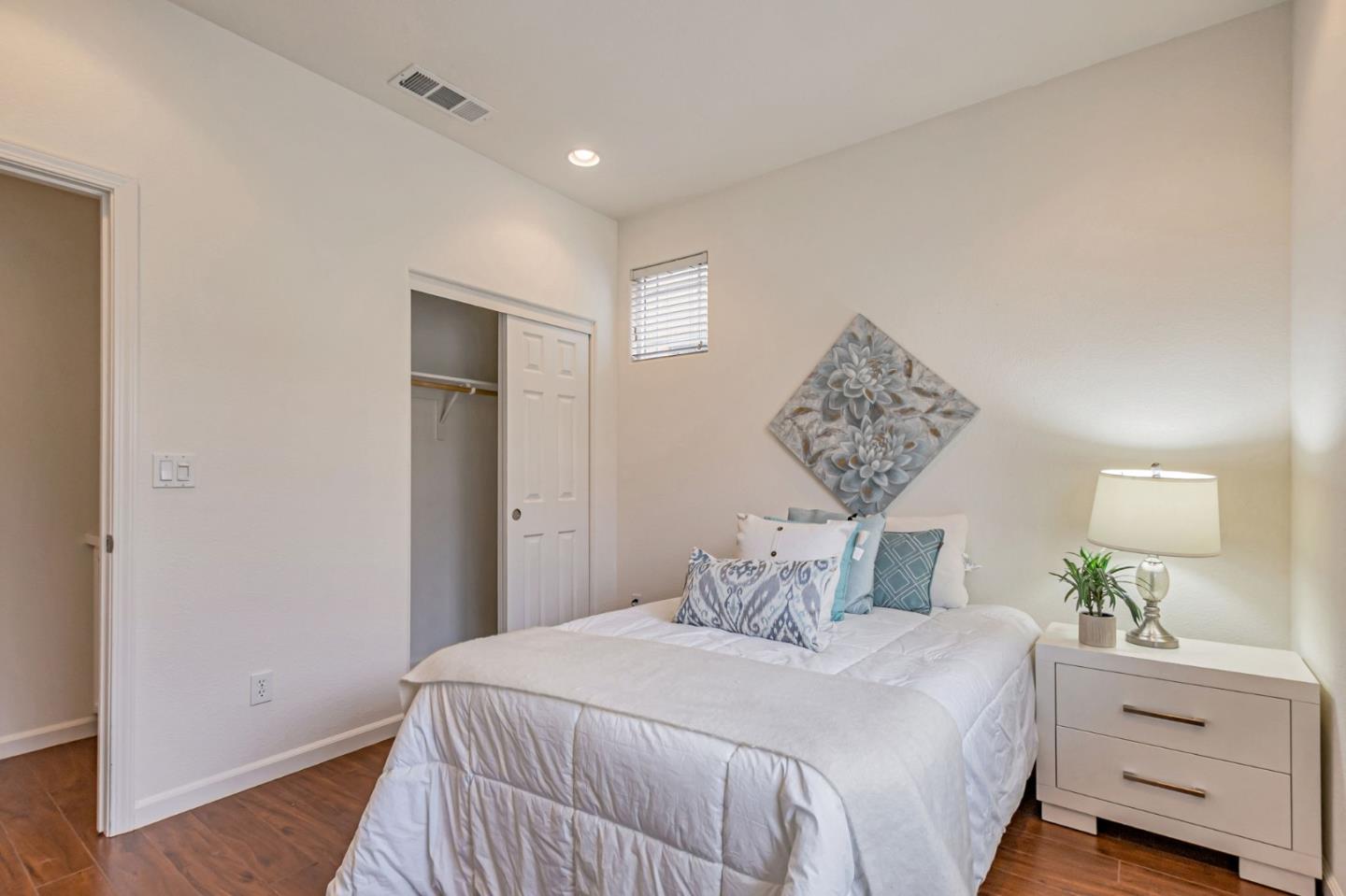 1103 Vida Larga Loop Milpitas, CA 95035 - Photo 23 of 44 a bedroom with a bed and a window