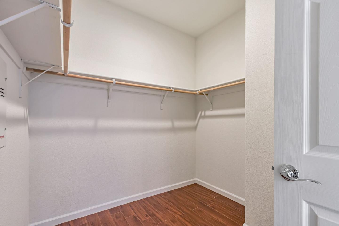1103 Vida Larga Loop Milpitas, CA 95035 - Photo 27 of 44 a view of a room with wooden floor