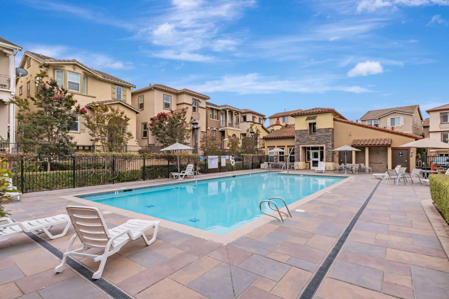 1103 Vida Larga Loop Milpitas, CA 95035 - Photo 40 of 44 a view of a house with a swimming pool