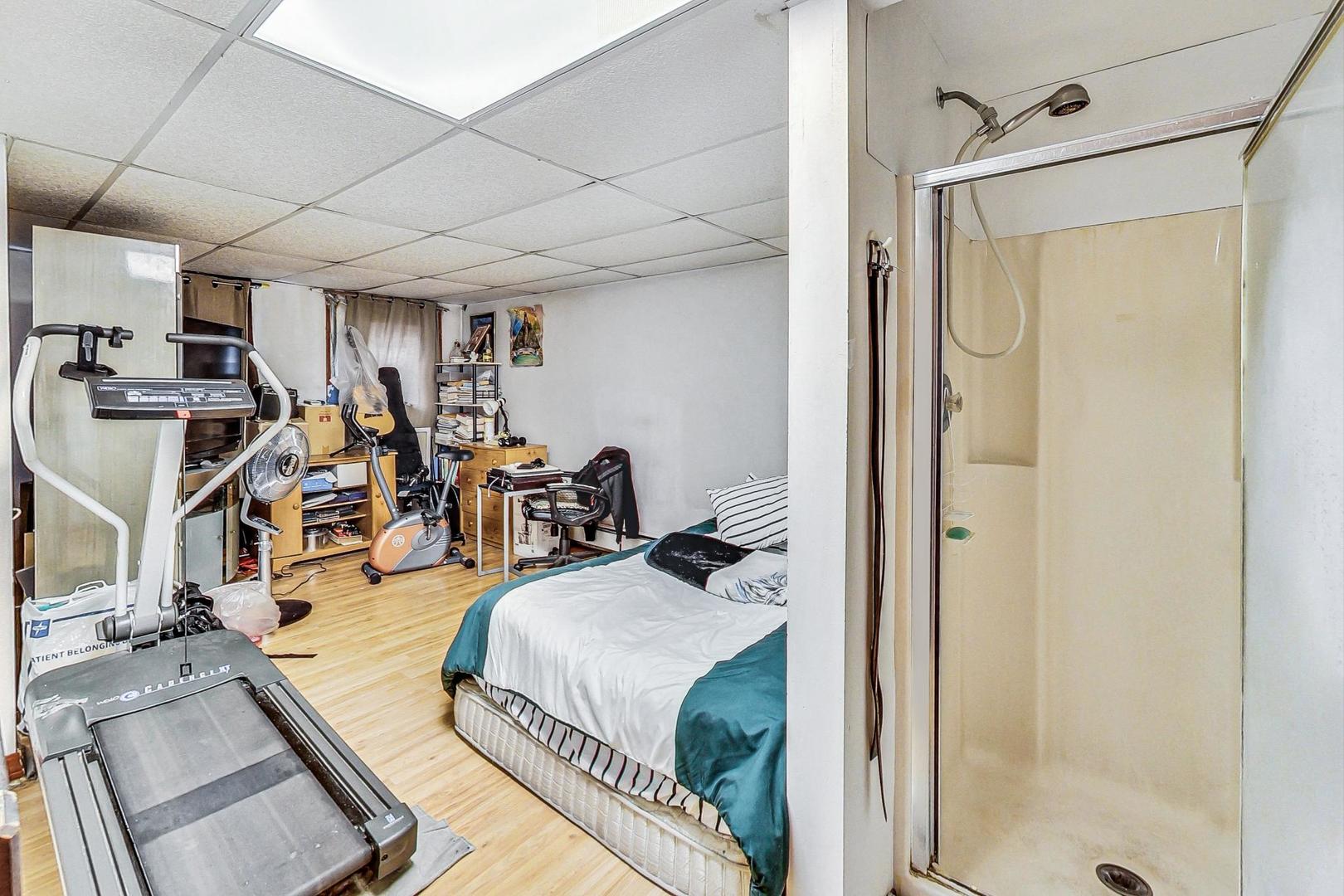 8803 Robin Drive Des Plaines, IL 60016 - Photo 8 of 18 a view of a room with gym equipment