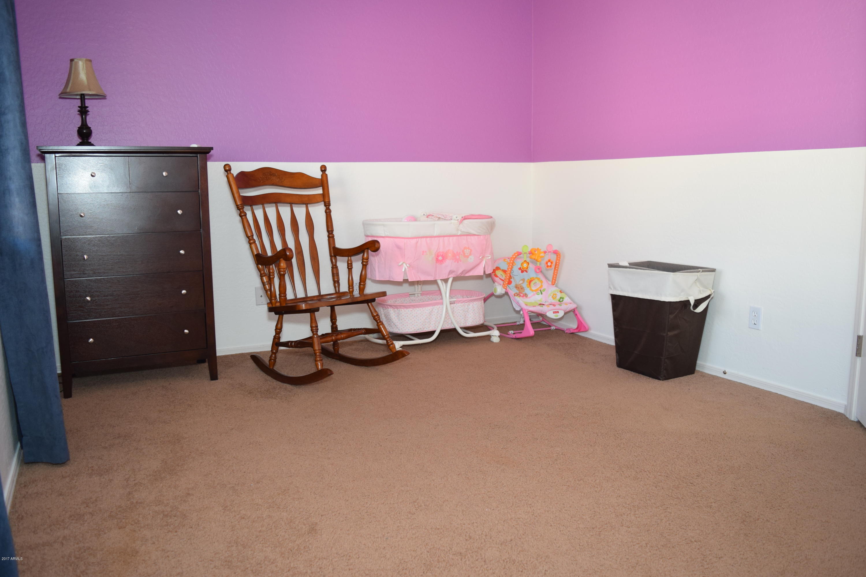 15761 West Calavar Road Surprise, AZ 85379 - Photo 17 of 36 a room with furniture and air hockey table