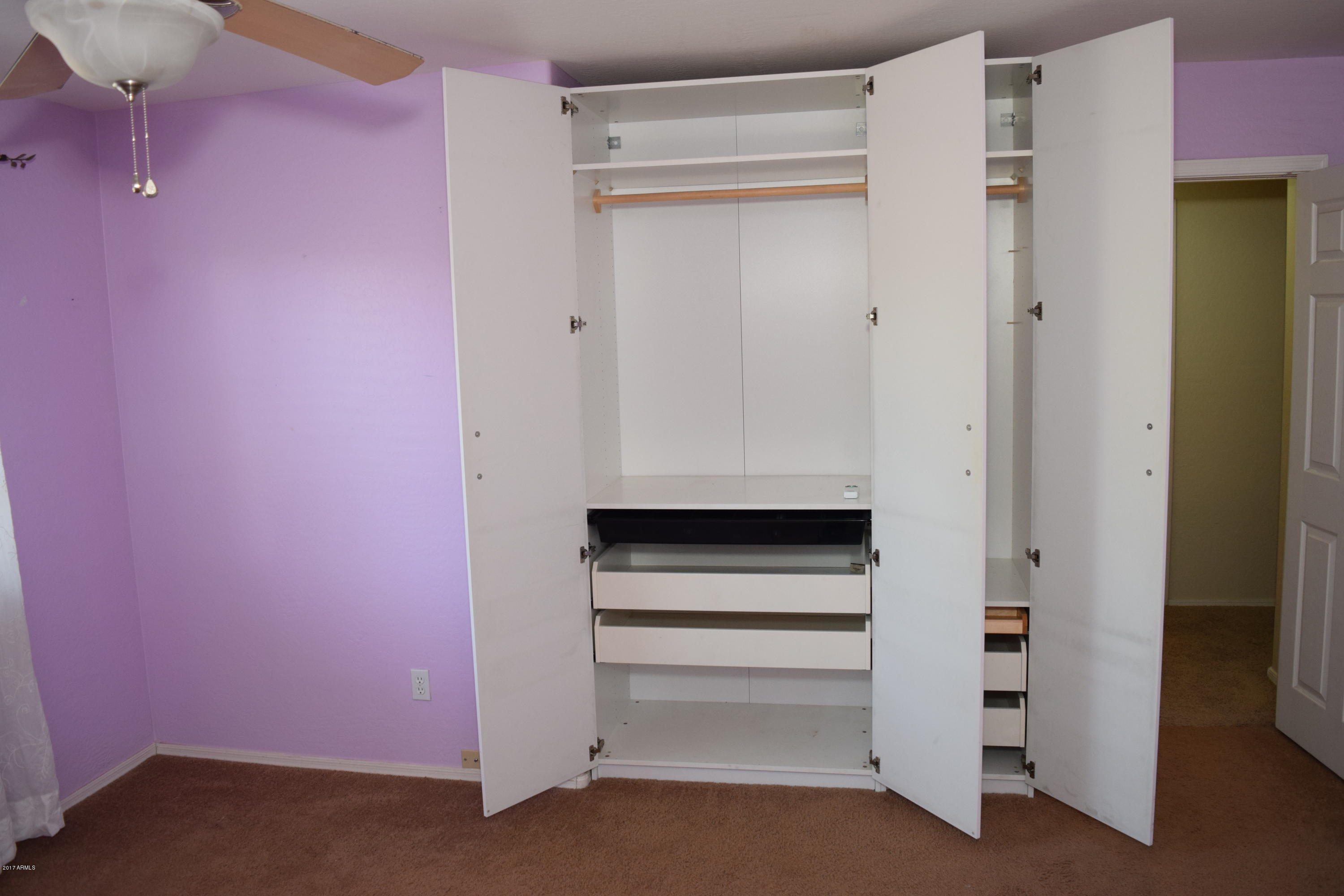 15761 West Calavar Road Surprise, AZ 85379 - Photo 20 of 36 a view of walk in closet