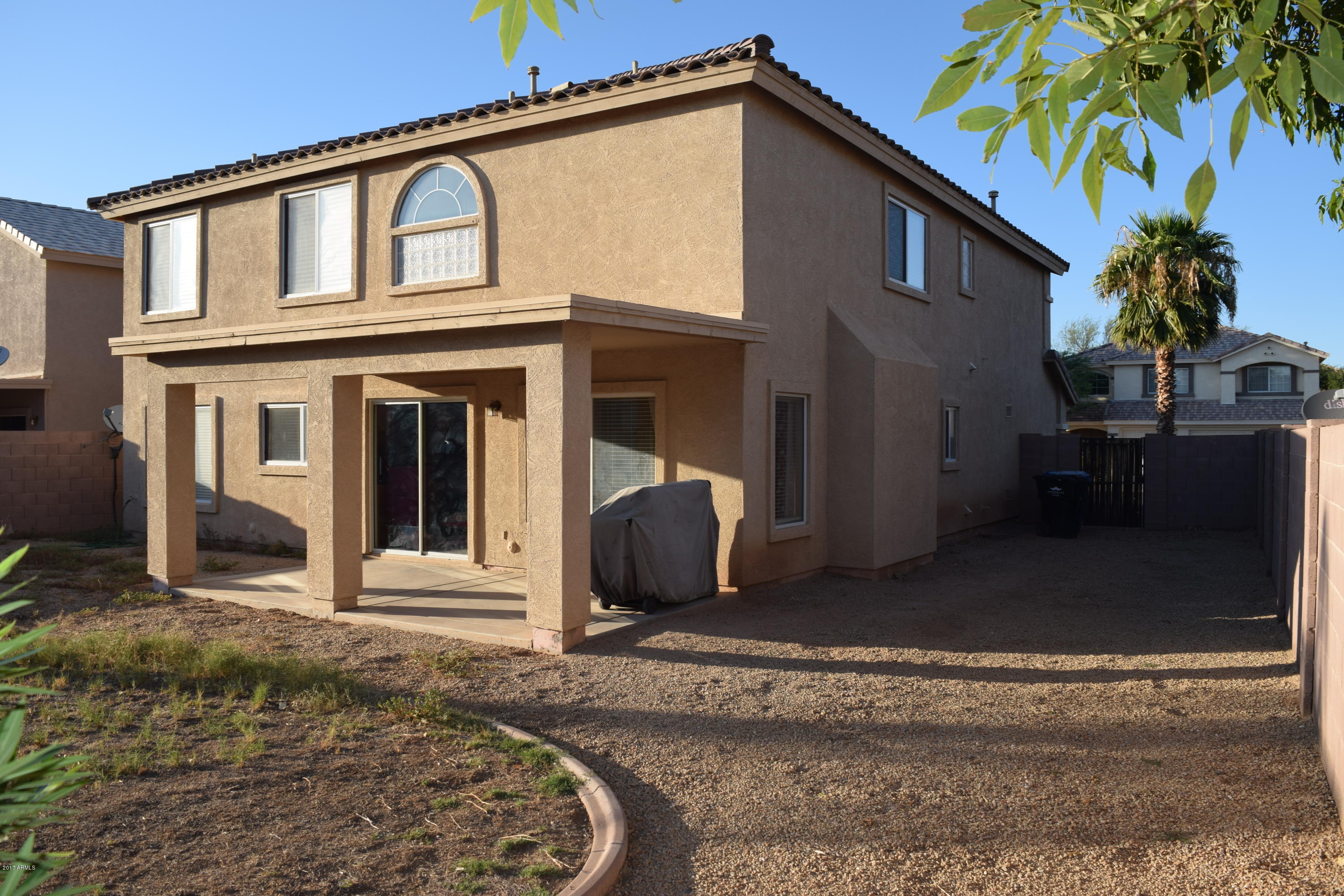15761 West Calavar Road Surprise, AZ 85379 - Photo 35 of 36 a view of a house with a patio