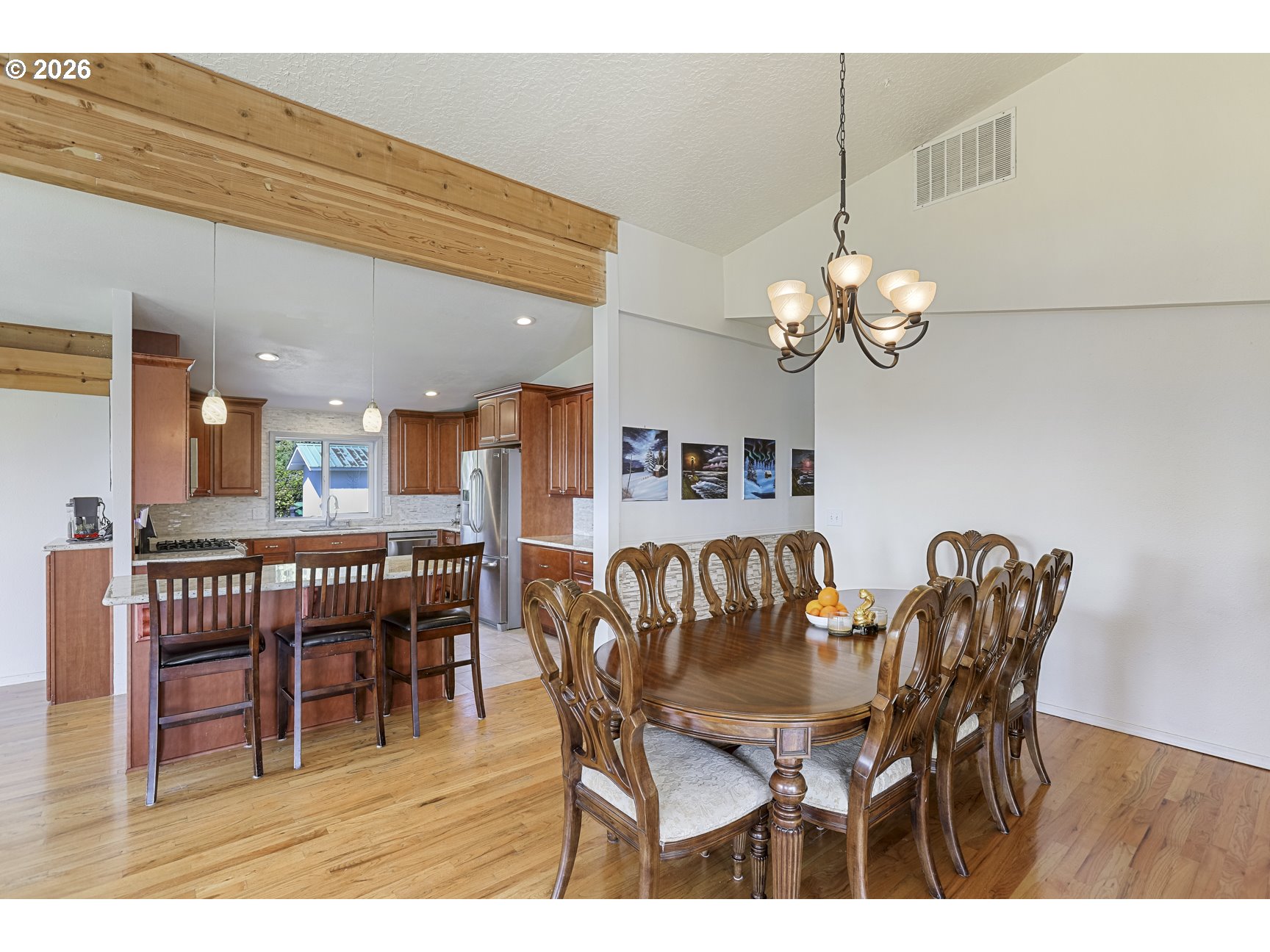 33411 Blaha Road Warren, OR 97053 - Photo 11 of 48 a dining room with furniture and chandelier