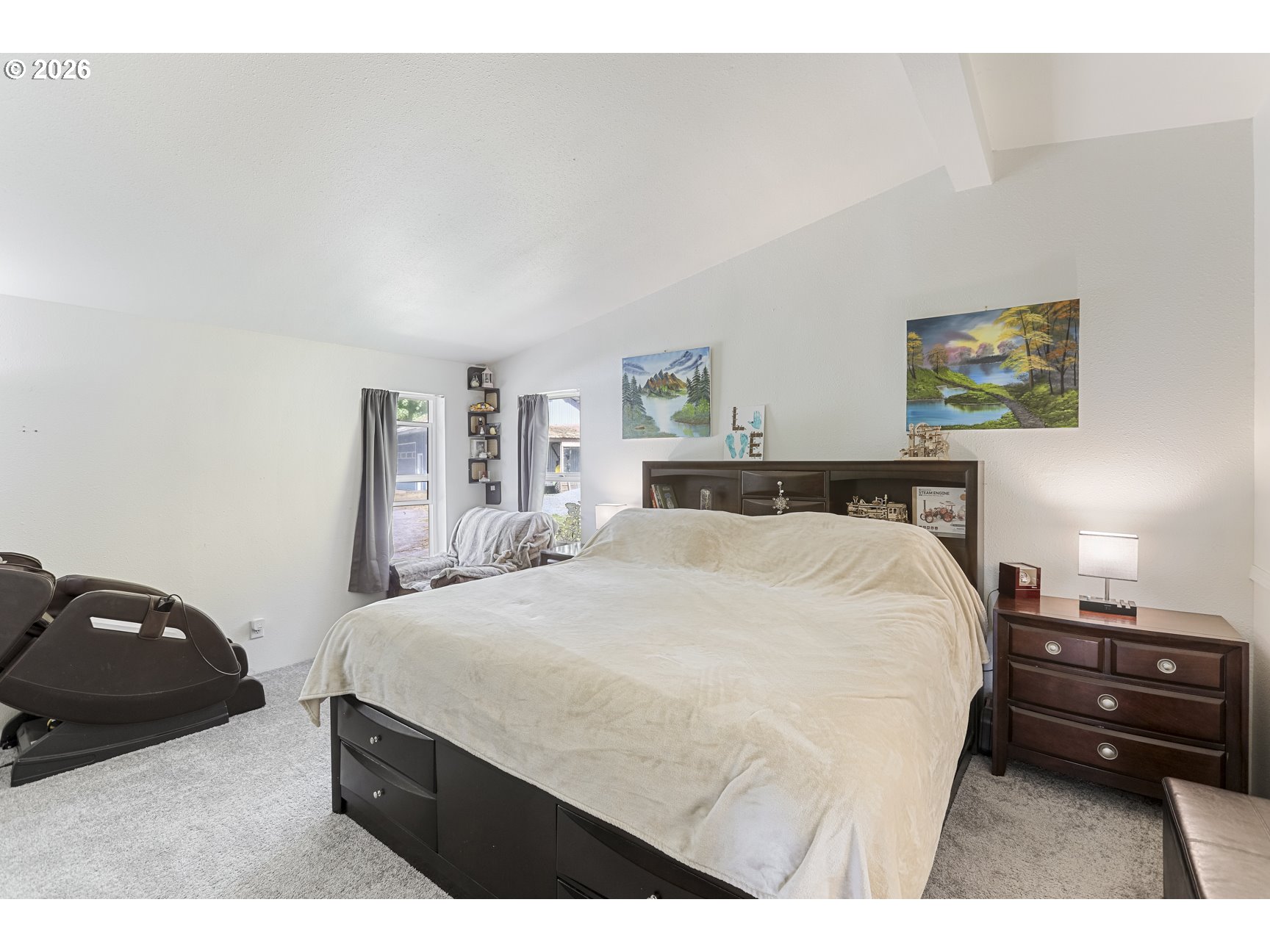 33411 Blaha Road Warren, OR 97053 - Photo 18 of 48 a bedroom with a bed and a night stand